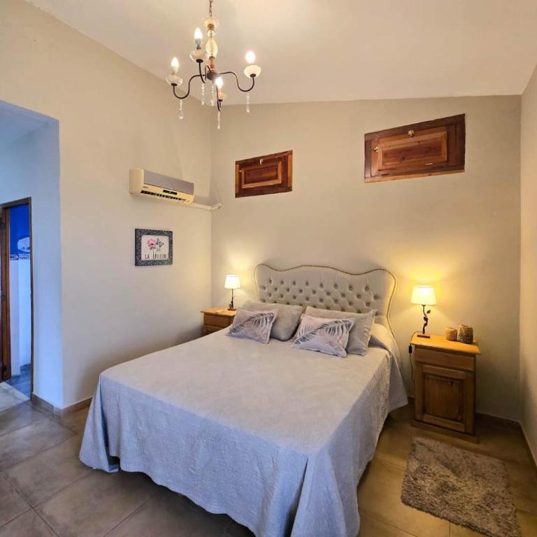 Hermosa casa de veraneo con pileta - Three-Bedroom House - 24