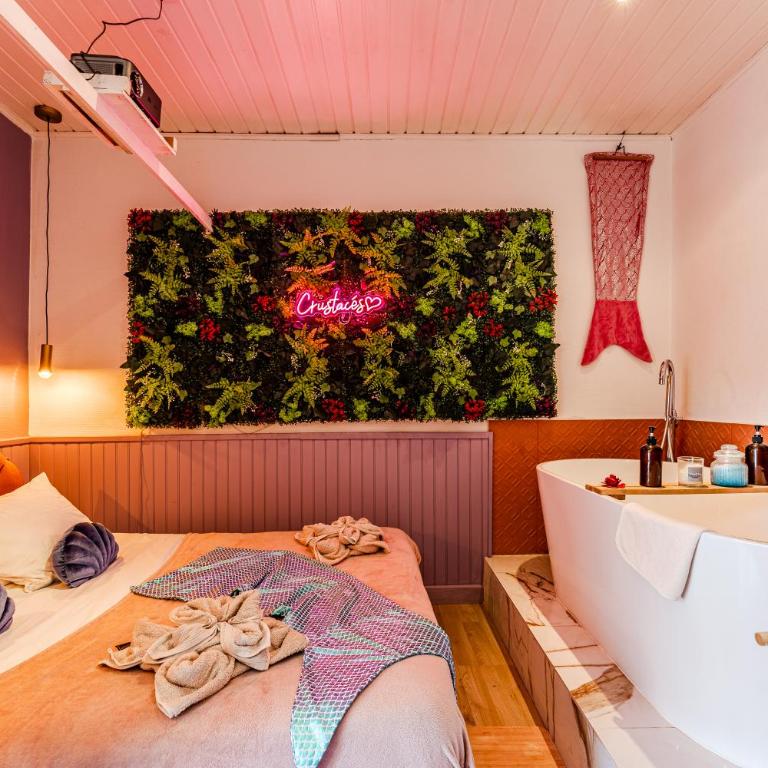 Coquillages et crustacés, vidéoprojecteur baignoire îlot chez Ivona Vacances - Appartement 1 Chambre - 2