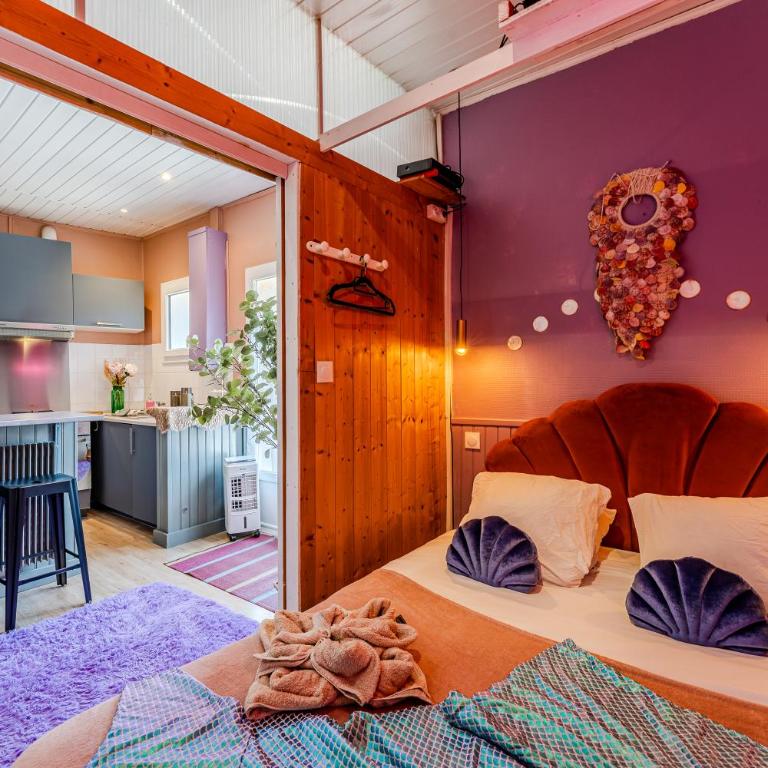 Coquillages et crustacés, vidéoprojecteur baignoire îlot chez Ivona Vacances - Appartement 1 Chambre - 4