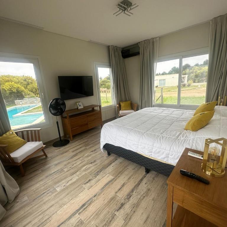 Casa con pileta y comodidades en Costa Esmeralda - Vacation Home - 10