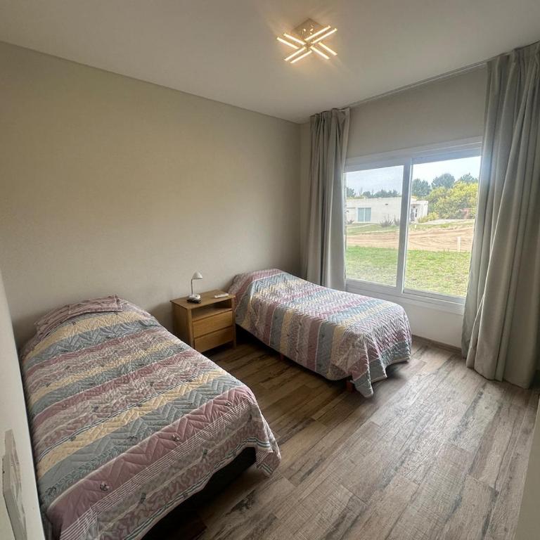 Casa con pileta y comodidades en Costa Esmeralda - Vacation Home - 15