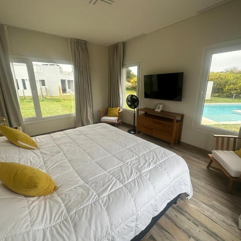 Casa con pileta y comodidades en Costa Esmeralda - Vacation Home - 9