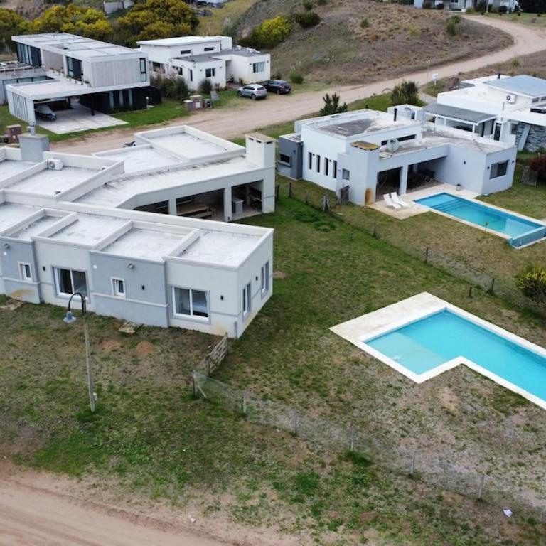 Casa con pileta y comodidades en Costa Esmeralda - Vacation Home - 34