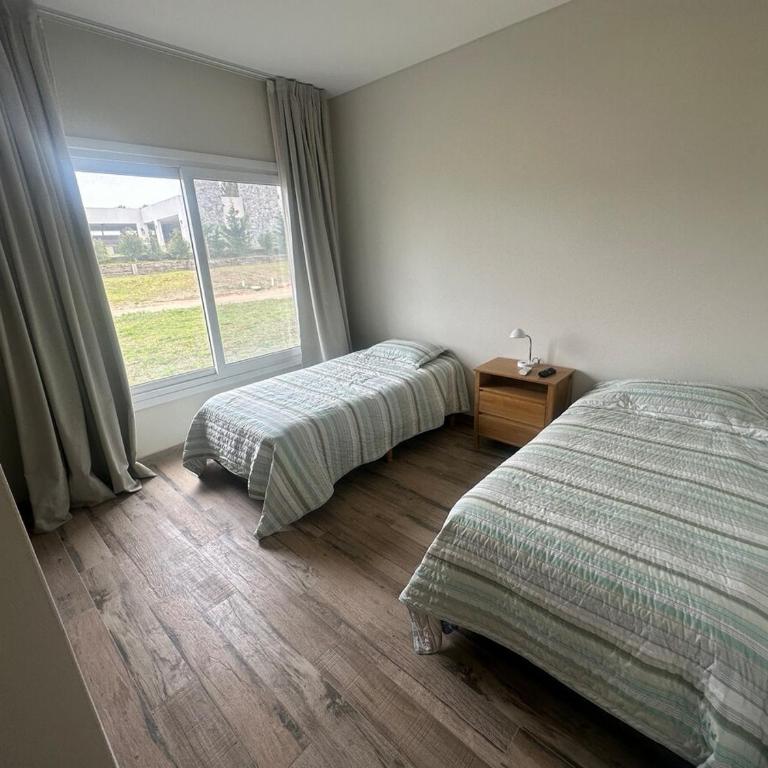 Casa con pileta y comodidades en Costa Esmeralda - Vacation Home - 23