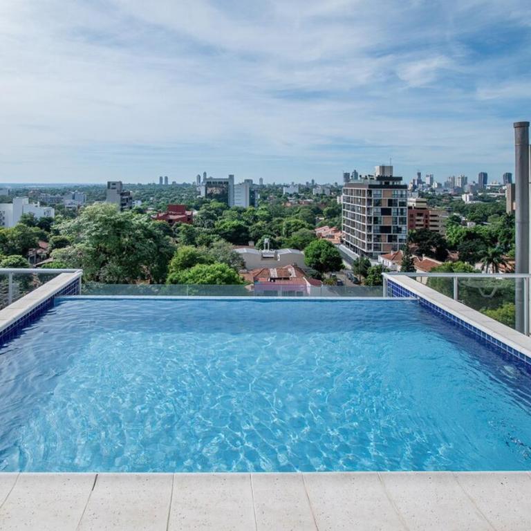 Modern 1BR Villa Morra with Balcony BBQ & Parking - Apartment - 56