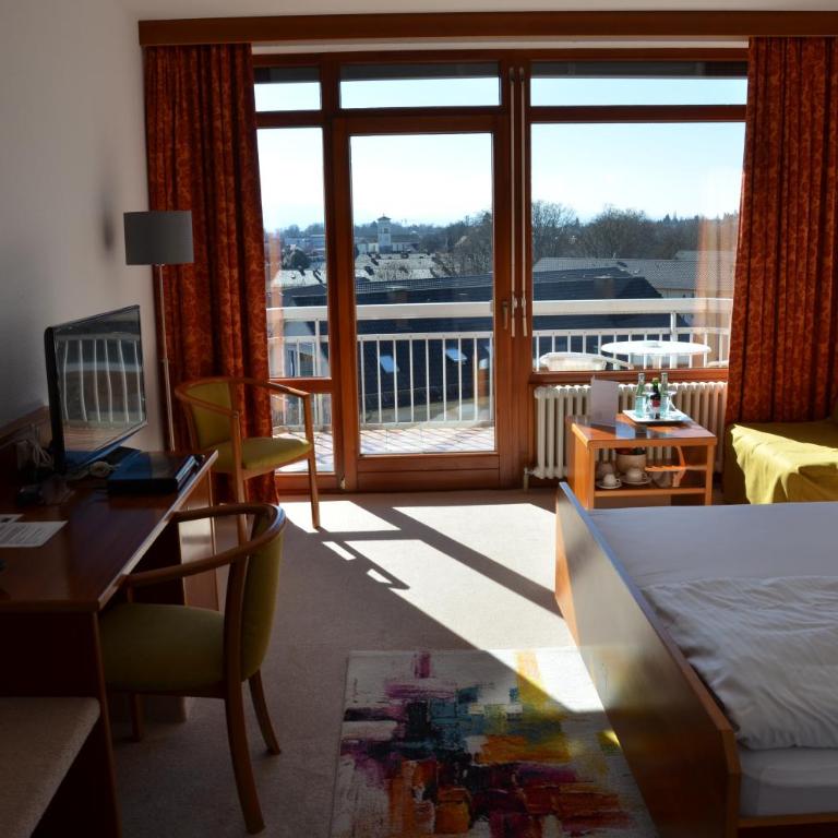 Hotel Garni Reulein - Doppelzimmer mit Seeblick und Balkon - 7