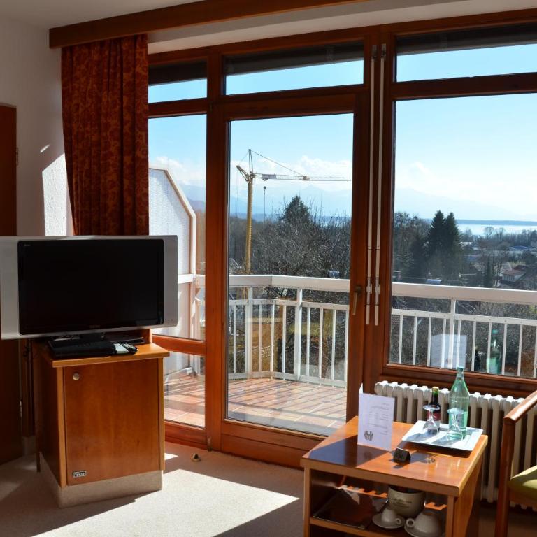 Hotel Garni Reulein - Doppelzimmer mit Seeblick und Balkon - 4
