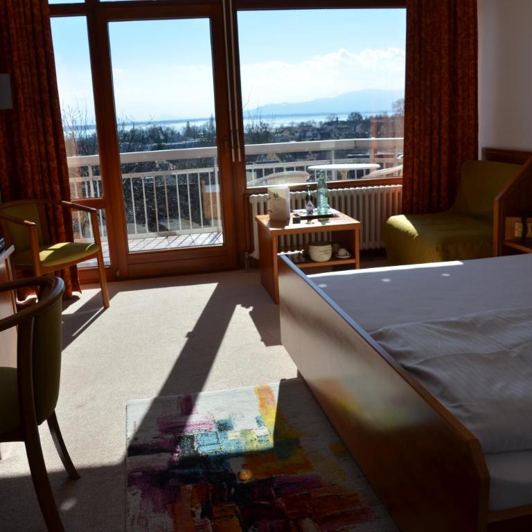 Hotel Garni Reulein - Doppelzimmer mit Seeblick und Balkon - 13