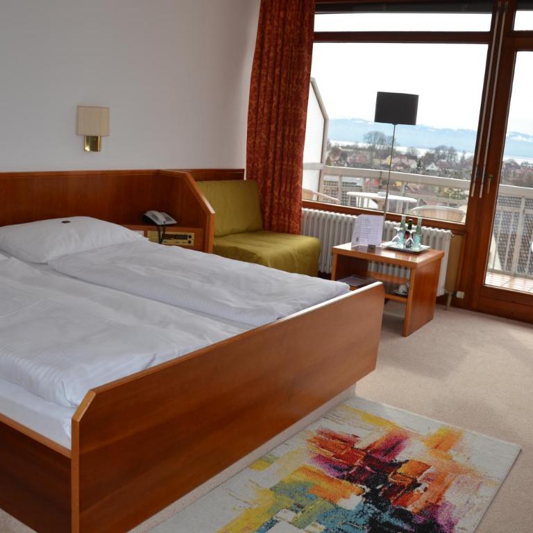 Hotel Garni Reulein - Doppelzimmer mit Seeblick und Balkon - 16