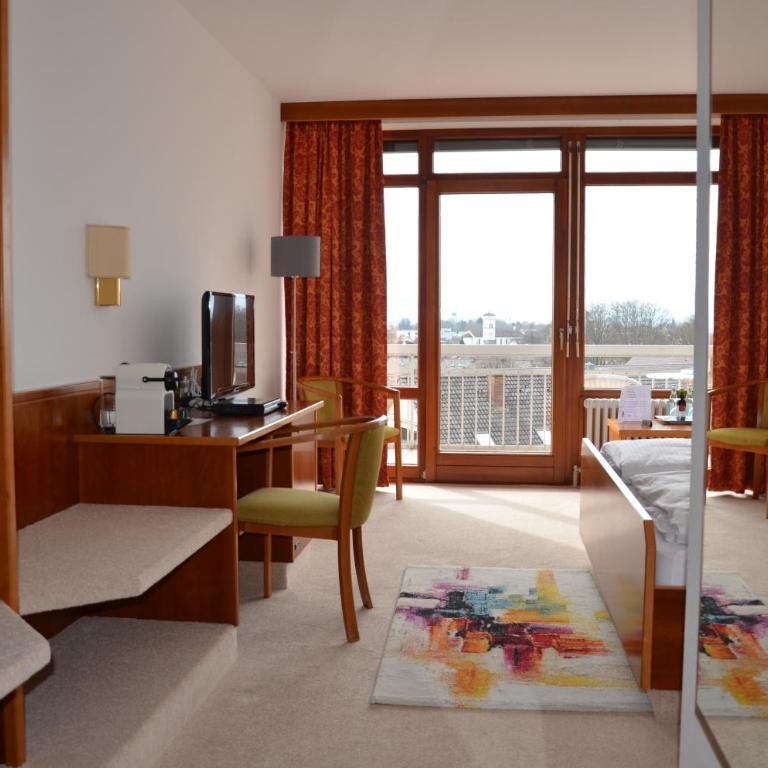 Hotel Garni Reulein - Doppelzimmer mit Seeblick und Balkon - 18
