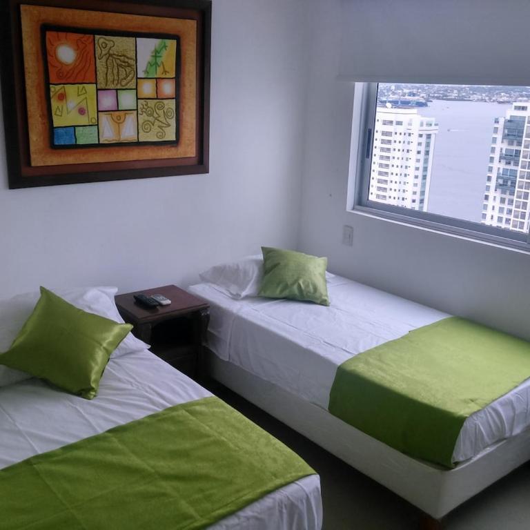 Apartamento remodelado para vacaciones o negocios - Apartamento de 2 dormitorios con balcón y vistas al mar - 18