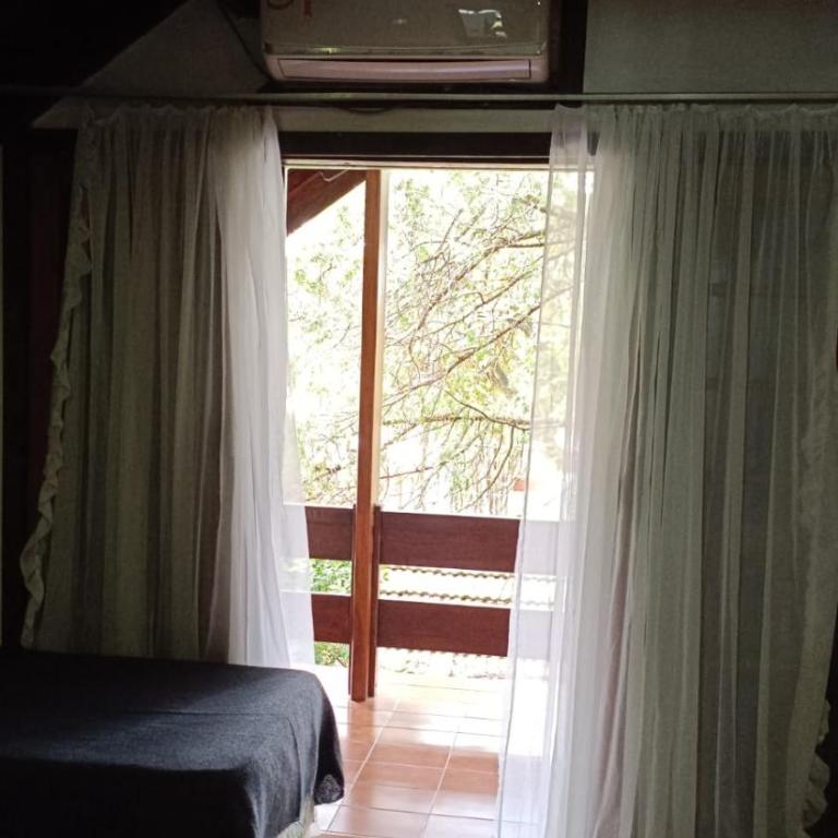Petit Hotel Caraguata - Habitación Familiar con vistas al jardín - 4