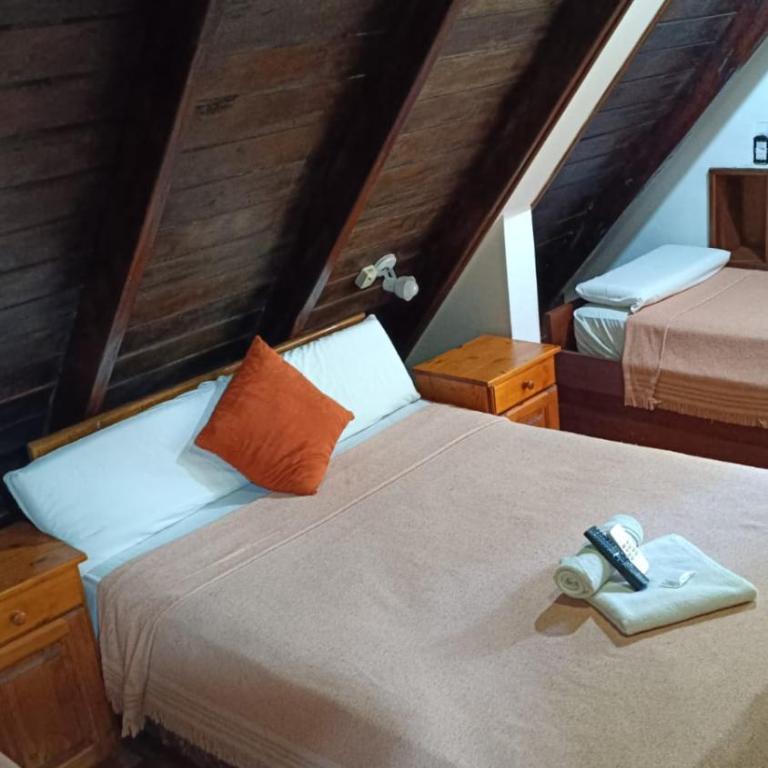 Petit Hotel Caraguata - Habitación Familiar con vistas al jardín - 5