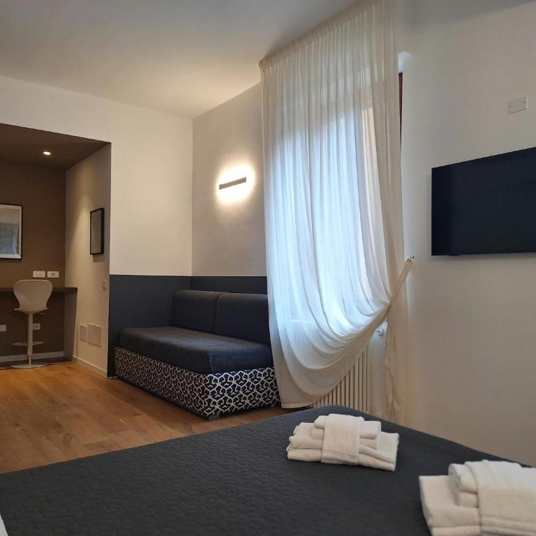 Leoni Suites - Camera Tripla Comfort - 17