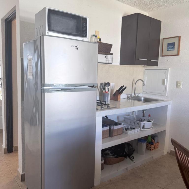Beachfront 1BR Beach & Pool Lagoon Sunset View Hotel Zone - One-Bedroom Apartment - 18