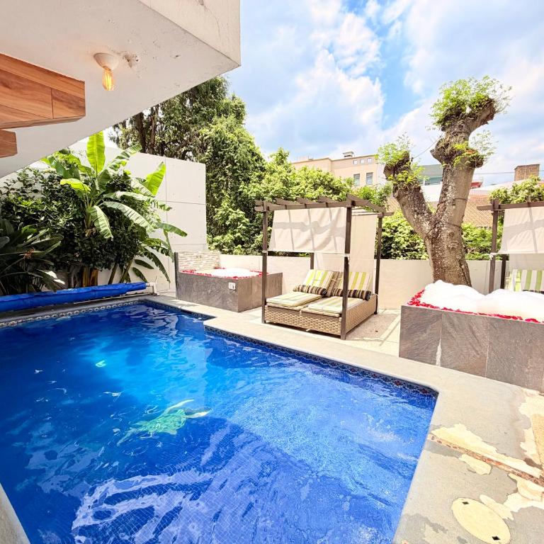 Loft muy amplio con alberca climatizada! Cuernavaca somos los únicos en ofrecerte 2 jacuzzis premium con agua caliente y sistema de hidromasaje tipo Spa! Elegante cama para alberca! Impresionantes vistas en la terraza panorámica con asador! Wi-Fi gratis! - Loft - 4