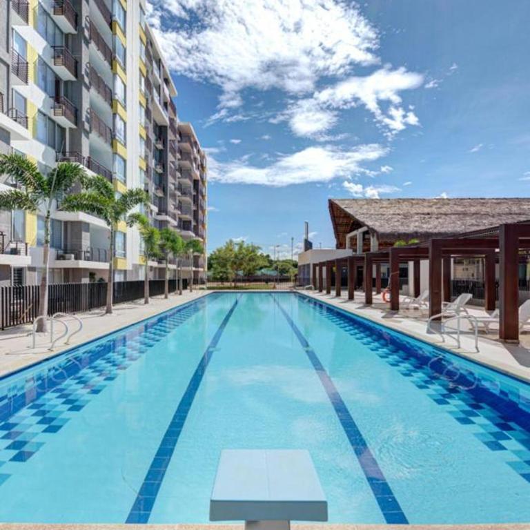 Apartamento en Ricaurte Club House con Piscina - Three-Bedroom Apartment with Balcony - 16