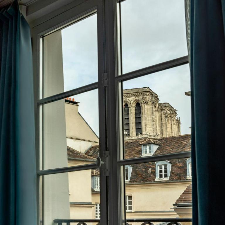 Maison Colbert member of Meliá Collection Notre-Dame - Chambre Supérieure - Vue Partielle sur Notre-Dame - 7