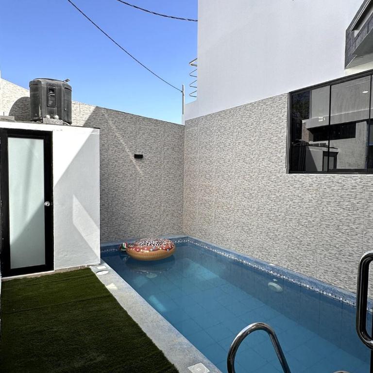 Casa con piscina temperada y Aire Acondicionado en zona exclusiva - Four-Bedroom House - 49