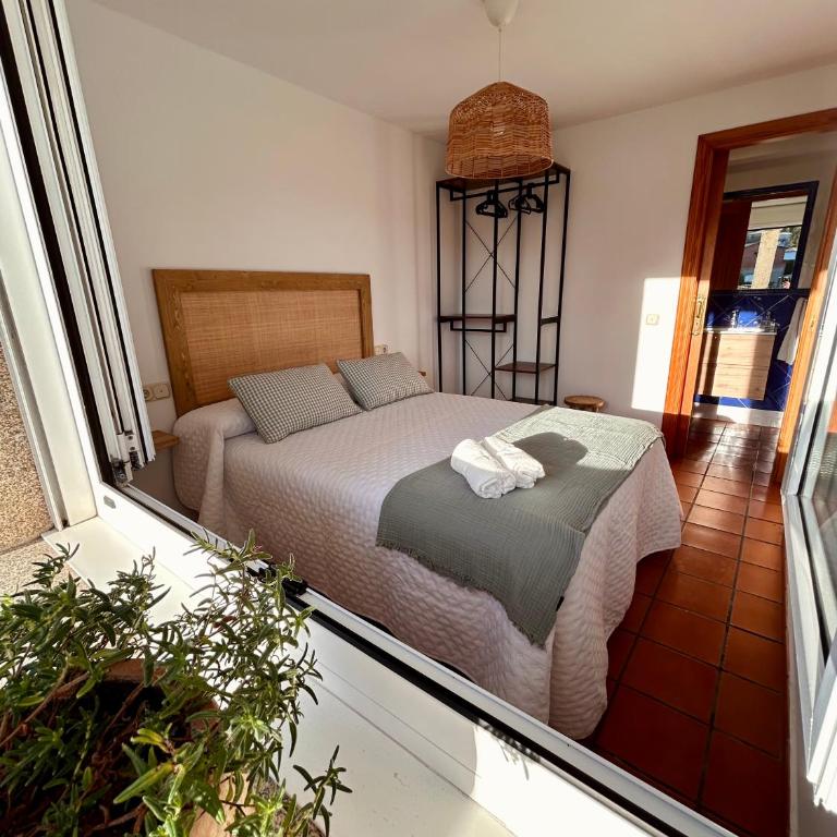 Coqueto apartamento en O Grove con jardín y parking - Apartamento de 1 dormitorio - 2