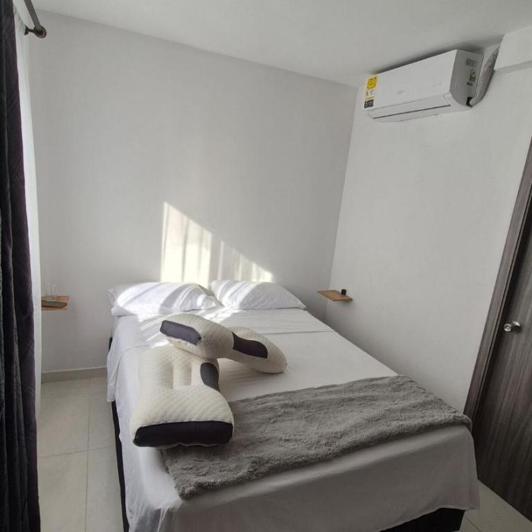 Apartamento entero cerca a la playa, aire acondicionado, wifi - Three-Bedroom Apartment - 37