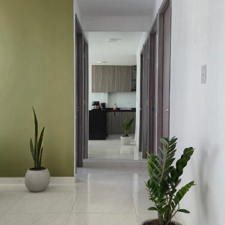 Apartamento entero cerca a la playa, aire acondicionado, wifi - Three-Bedroom Apartment - 42