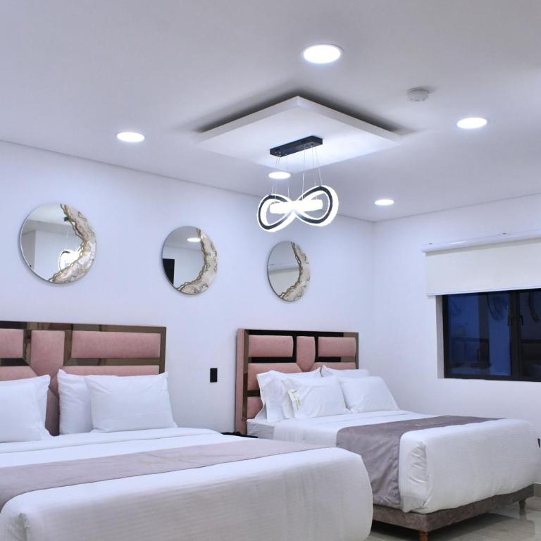 Ecohotel Dubai del Oriente - Quadruple Room with Garden View - 12