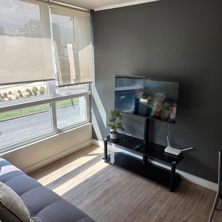 Moderno y acogedor departamento a metros del metro Irarrazaval - One-Bedroom Apartment with Park View - 18