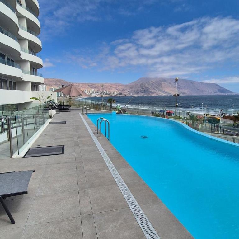 Departamento 1D 1B 1E con balcon en peninsula al lado de Playa Cavancha - Apartamento de 2 dormitorios - 12