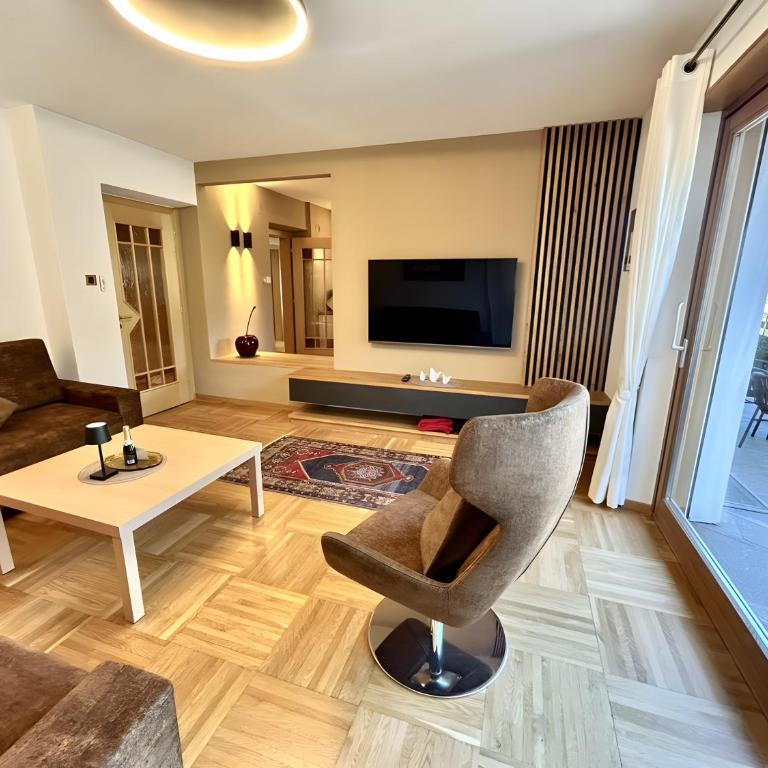 Apartments Tratter - Appartamento Deluxe con 2 Camere da Letto e Vista Giardino - 17