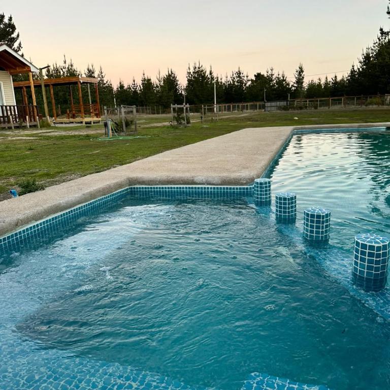 Cabañitas Zelada en un ambiente natural con piscina fogón Quincho Terraza parking full equipadas en 5000 mtrs - Casa de 2 dormitorios - 23