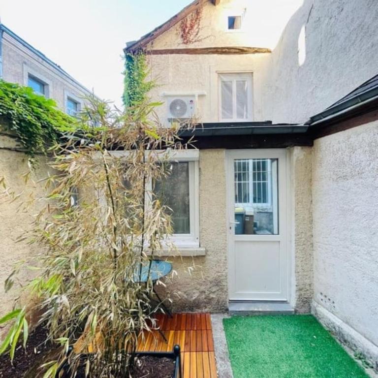 Charmante maison triplex avec jardin - Maison de Vacances - 1