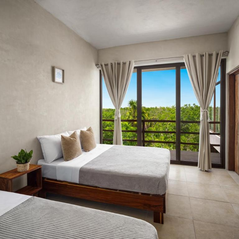 La Familia Casa and Suites - Estudio con vistas a la piscina - 1