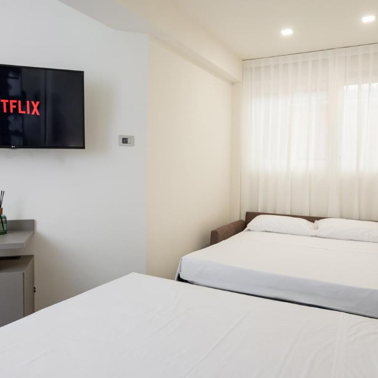 Mamma Mia Holidays - Sei Chiese - Deluxe Doppelzimmer mit Zustellbett - 4