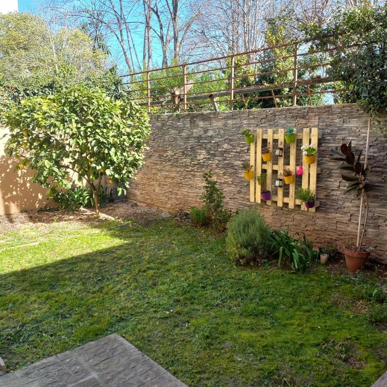Dpto Alquiler Centro Tandil - Apartamento de 1 dormitorio con vistas al jardín - 11