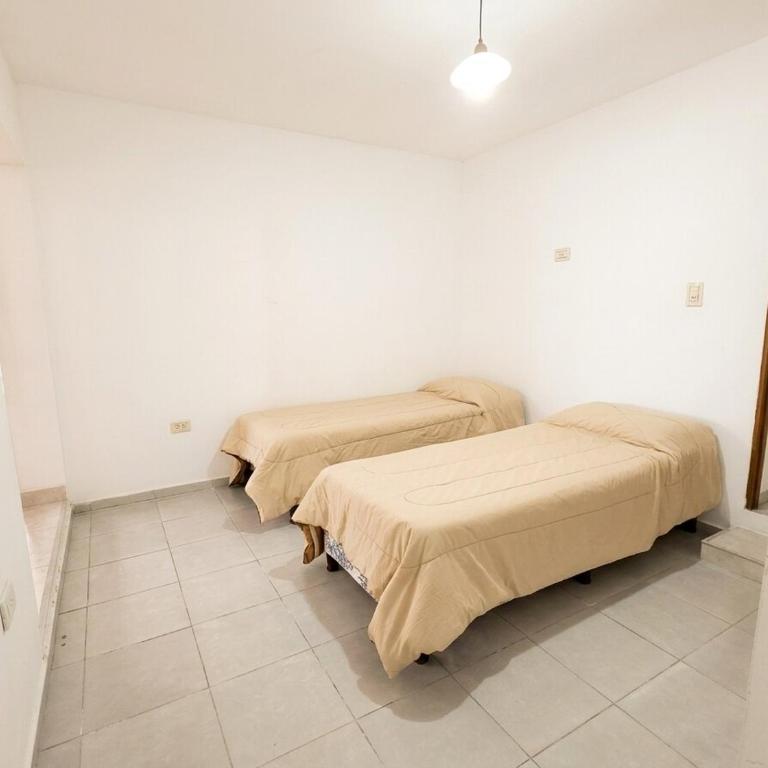 Casa 4 dorm en country privado - Pileta y golf - Four-Bedroom Vacation Home - 12