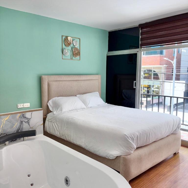 Plaza Nomad, Urban Rooms and Suites private jacuzzi Quito La Carolina - Deluxe Room - 1