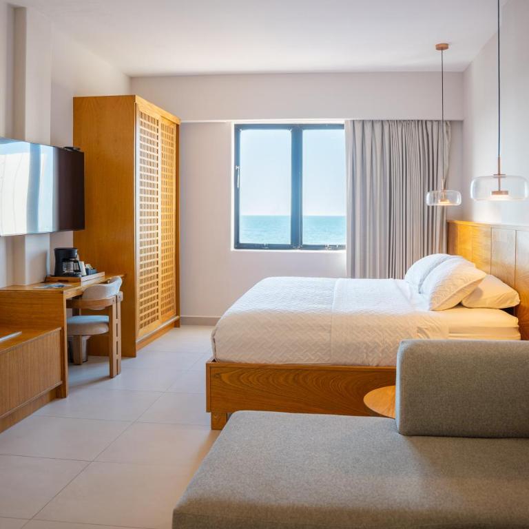 Costa Elegante Hotel & Suites - Estudio con sofá cama - 1
