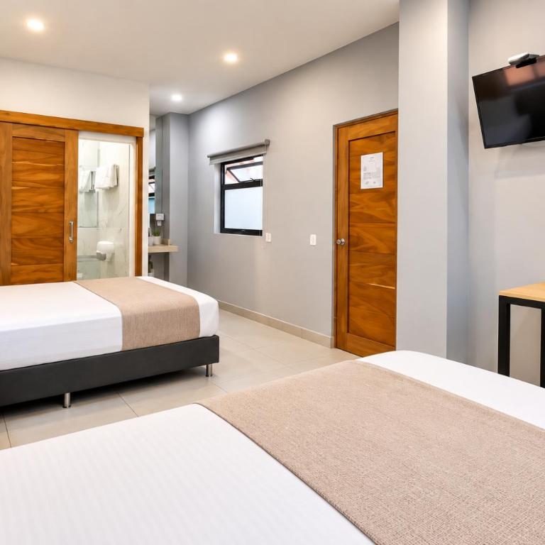 Stanza Hotel Sincelejo - Habitación Doble - 2 camas dobles - 3
