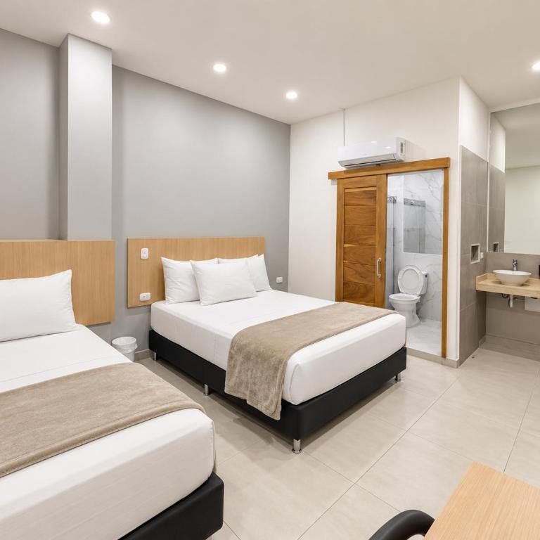 Stanza Hotel Sincelejo - Habitación Doble - 2 camas dobles - 4