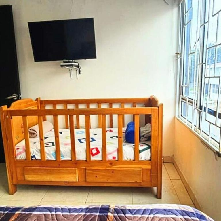 Acogedor apartamento familiar 2do piso - 06 personas - El Edén Centro Comercial - Three-Bedroom Apartment - 33