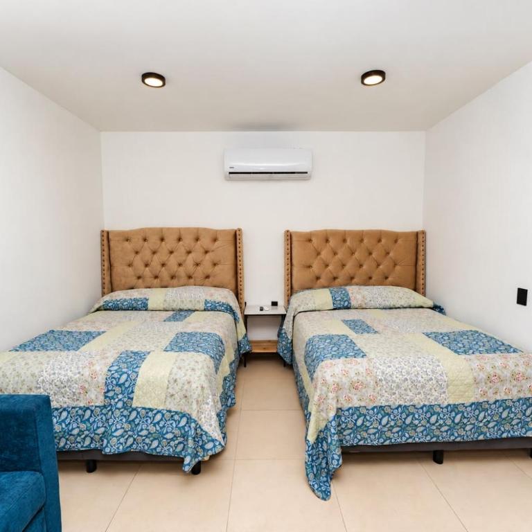 Apartamentos Torre II Condominios - Pet Friendly - Habitación Doble Grande - 1 o 2 camas - 3