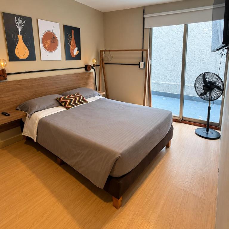 Apartamento privado con patio interno en Medellín ONE103 By Roots Rentals - Apartamento de 1 dormitorio - 2