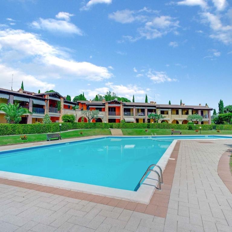 - Piscina e parcheggio - Casa a pochi passi dal Lago - One-Bedroom Apartment with Pool View - 1