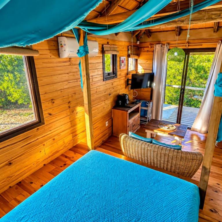 Cabaña Caribe Diseño único, piscina climatizada, parrillero y a 300 m de la playa Punta del Diablo - Casa con 1 dormitorio - 4