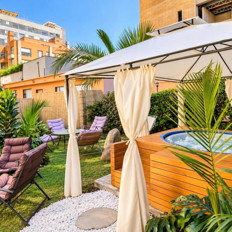 Villa Bamboo Oasis - NUJU Rentals Bogota - Apartamento con vistas al jardín - 14