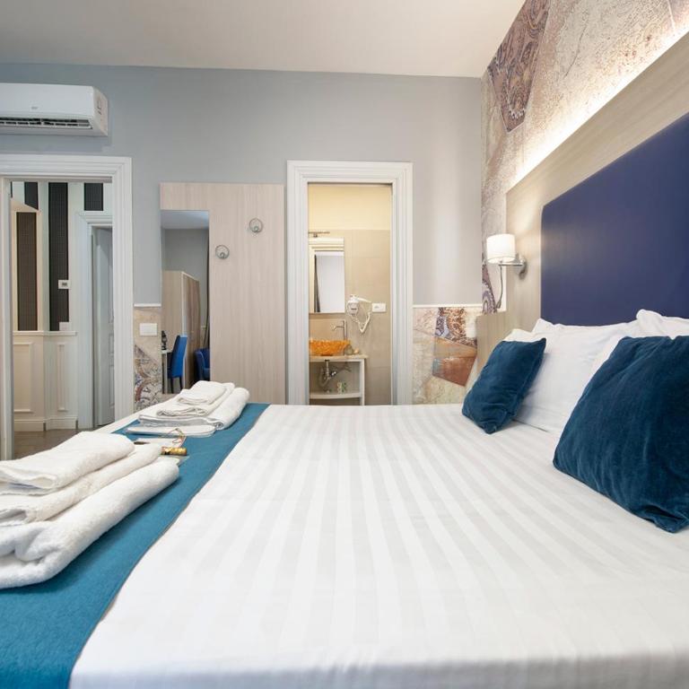 Bramble Luxury Suites - Camera Tripla Deluxe - 2