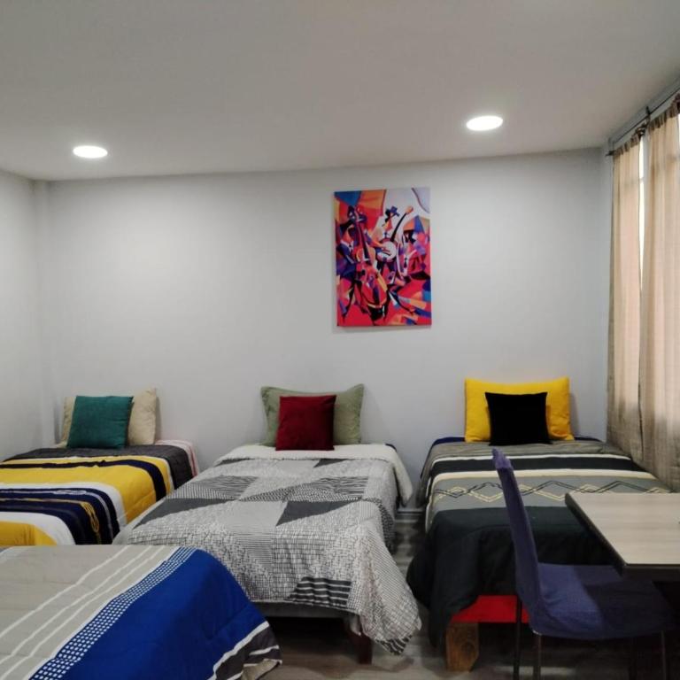 hostal mancora - Habitación Cuádruple Clásica - 1