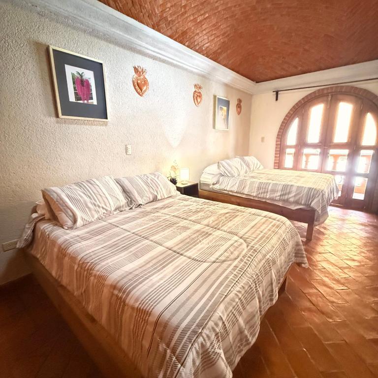 Hotel Casa Orquidea - Habitación Doble con baño privado - 2 camas - 2
