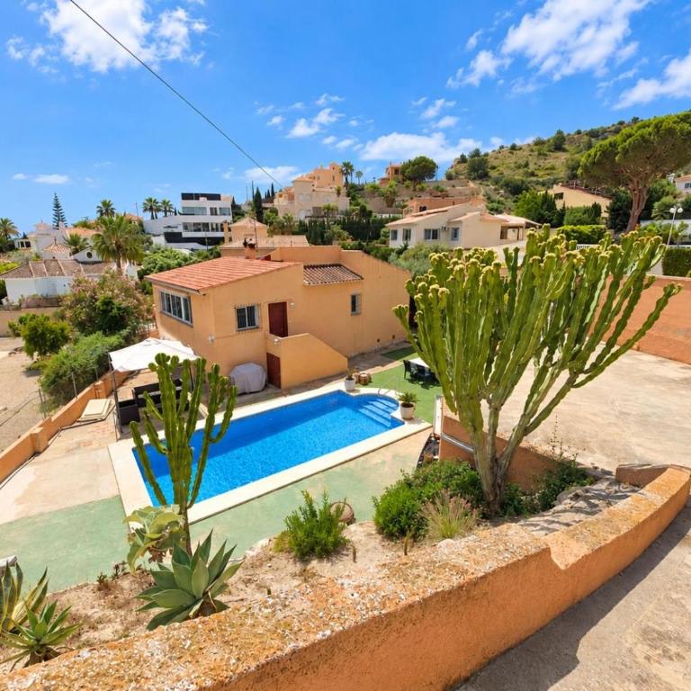 Casa de Playa con Piscina Estilo Rústico - Casa de 3 dormitorios - 1